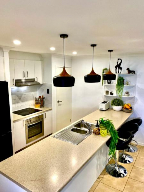 A peaceful private home away from home in Pacific Pines